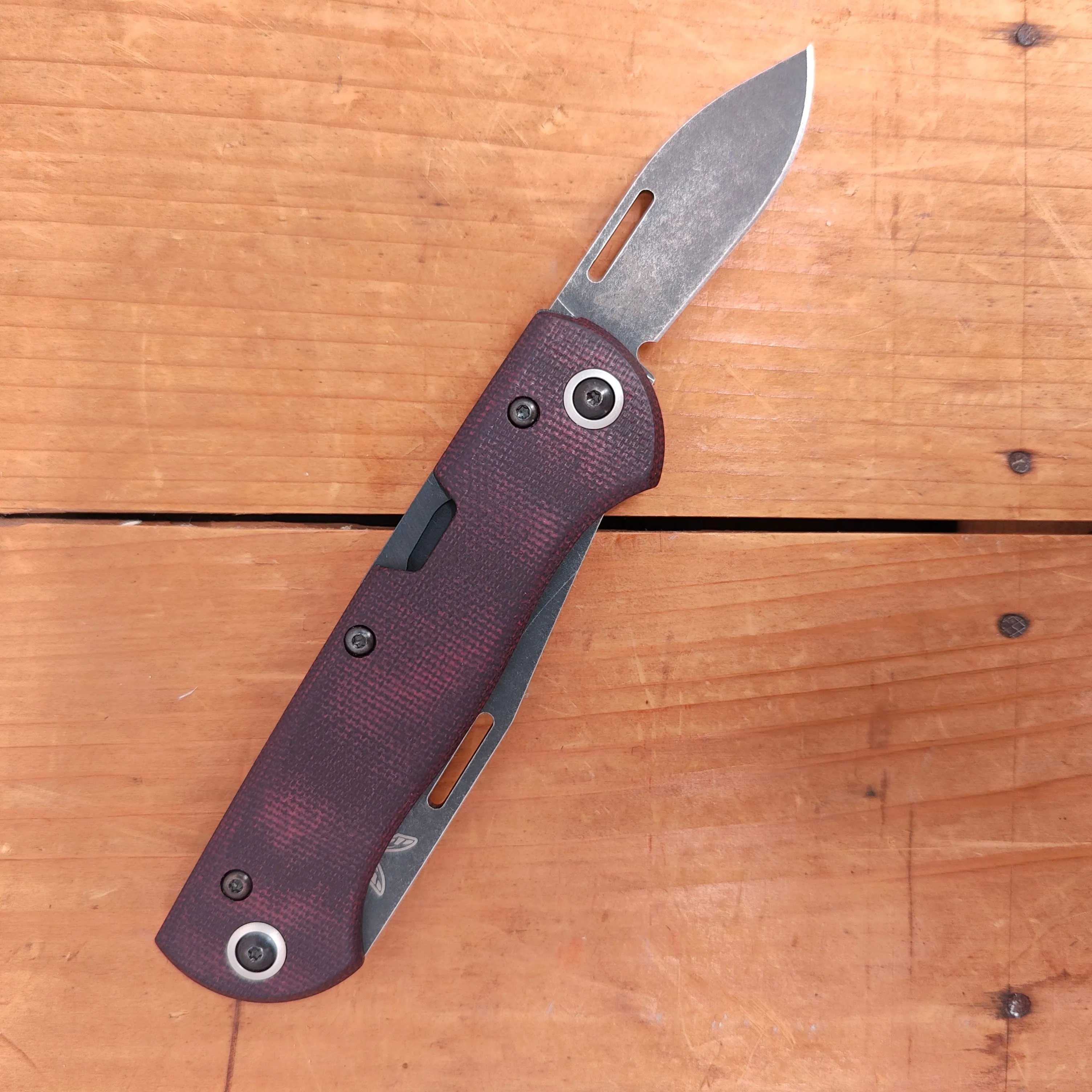 Benchmade 317BK-02 Weekender Drop Point CPM-S90V Lockback Double Red Micarta Handle with Second Blade and Bottle Opener